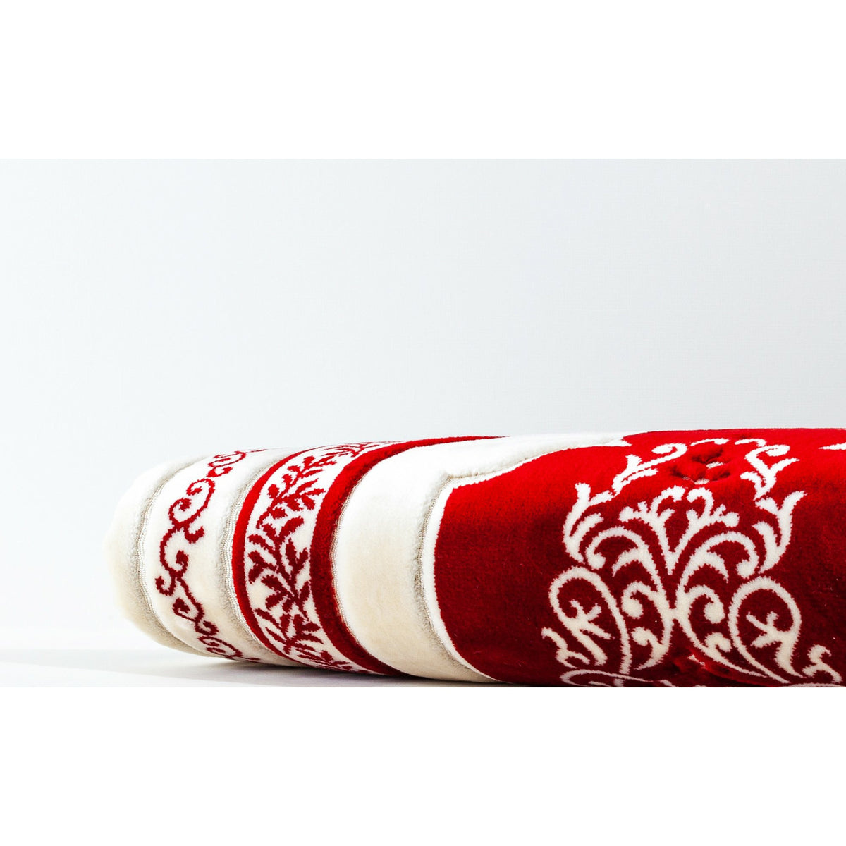 a close up of a red and white surfboard 