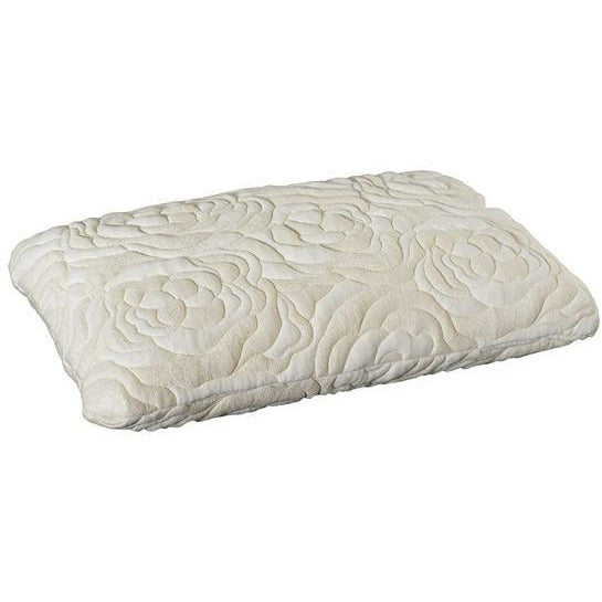 a bed with white sheets and pillows on it 